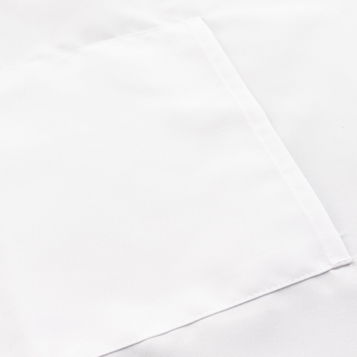 White premium polyester cooking apron with pockets.