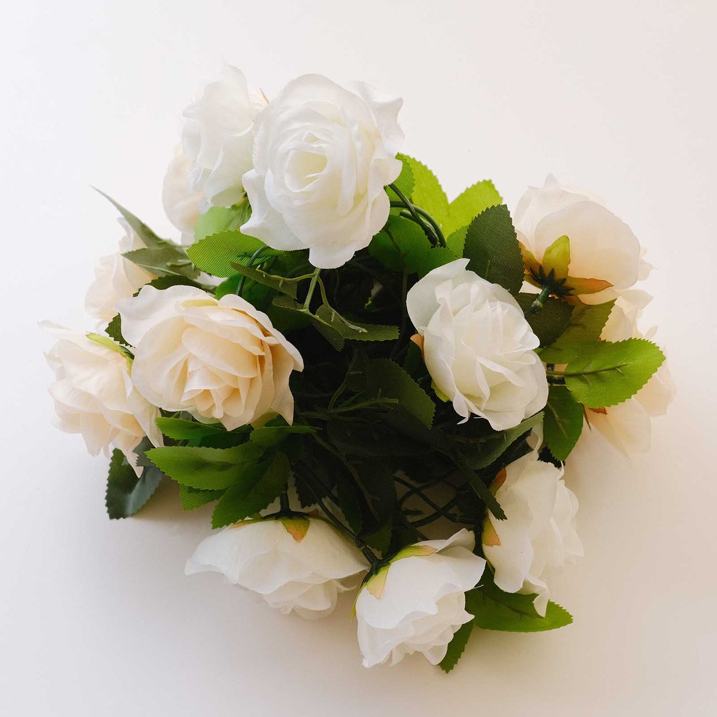 Cream ivory artificial silk flower garland with mini rose vines. #whtbkgd