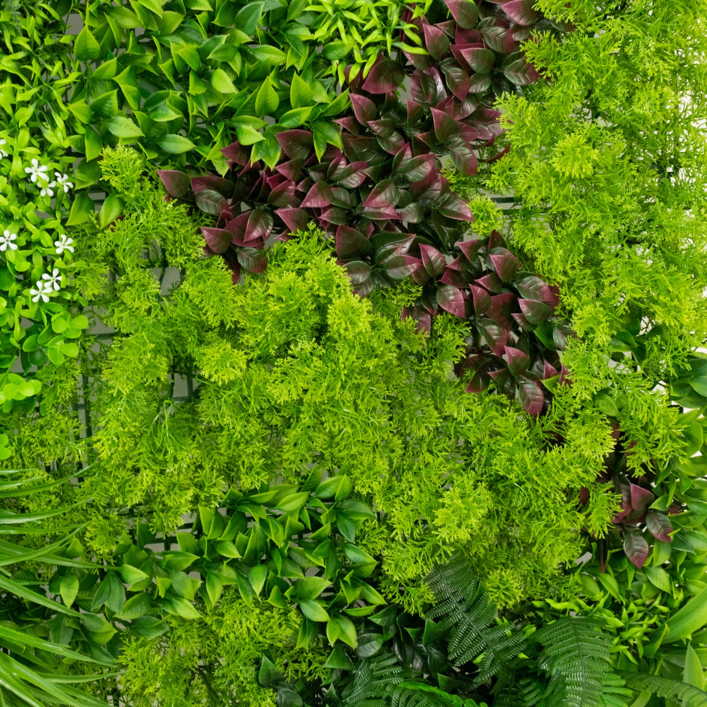 Mixed greenery wall backdrop panels with UV protection, featuring lush ferns and ivy leaves.