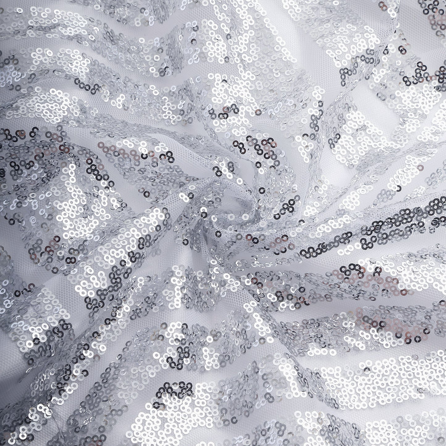 Silver geometric sequin event curtain drapes with satin backing.