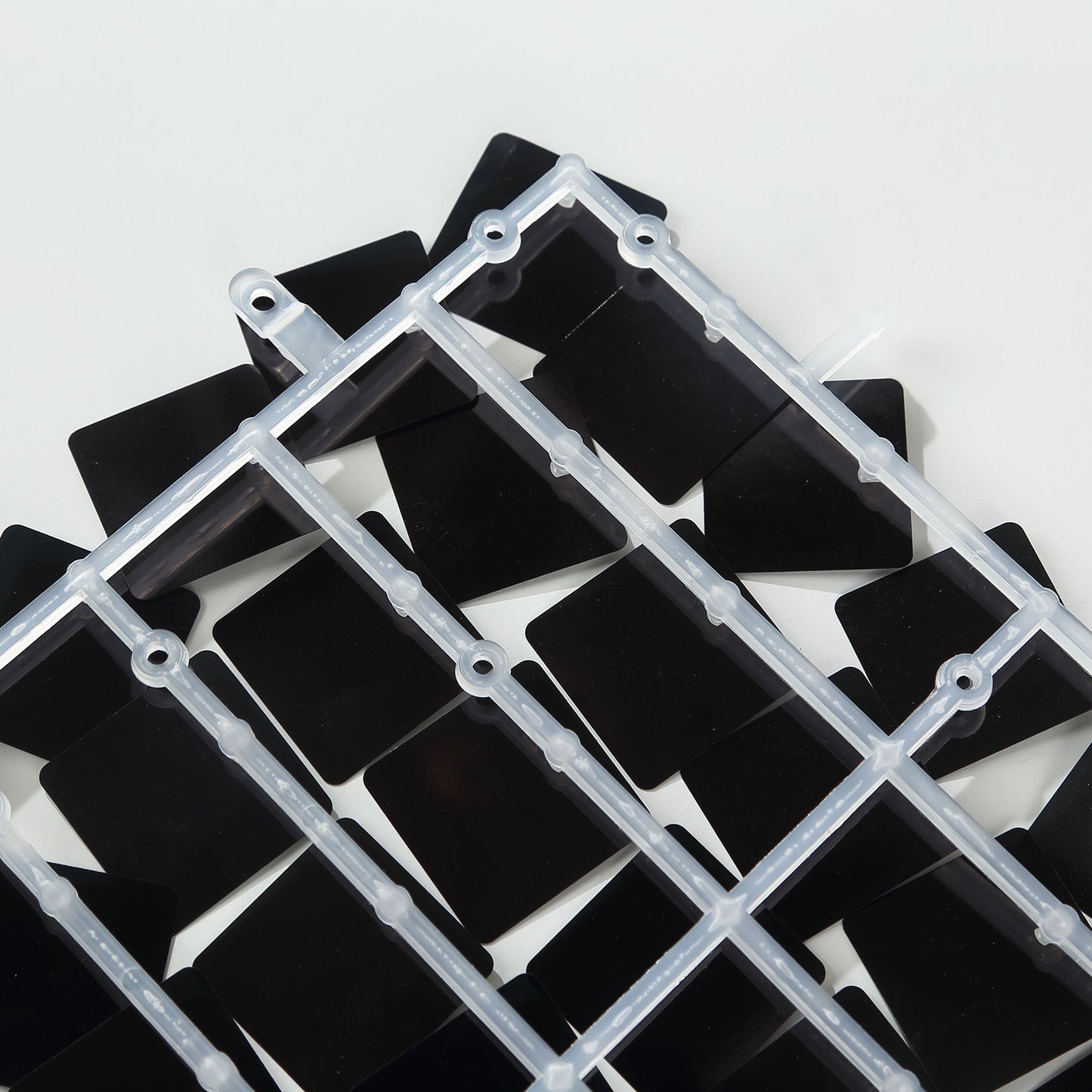 Shiny black square sequin wall backdrop panels for party decor.