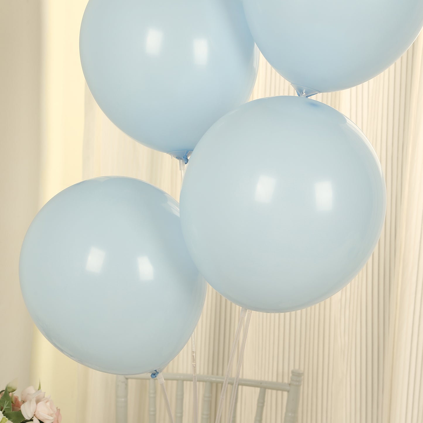 Matte pastel ice blue biodegradable balloons, eco-friendly party decorations.