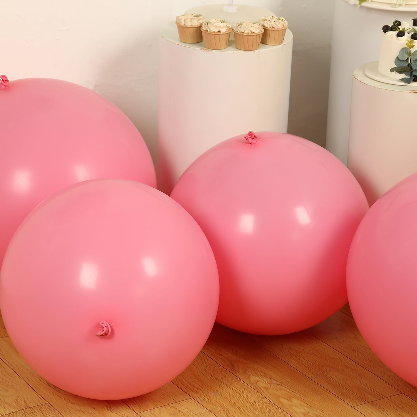 Large matte pastel pink biodegradable balloons, 36" round eco-friendly party decor.