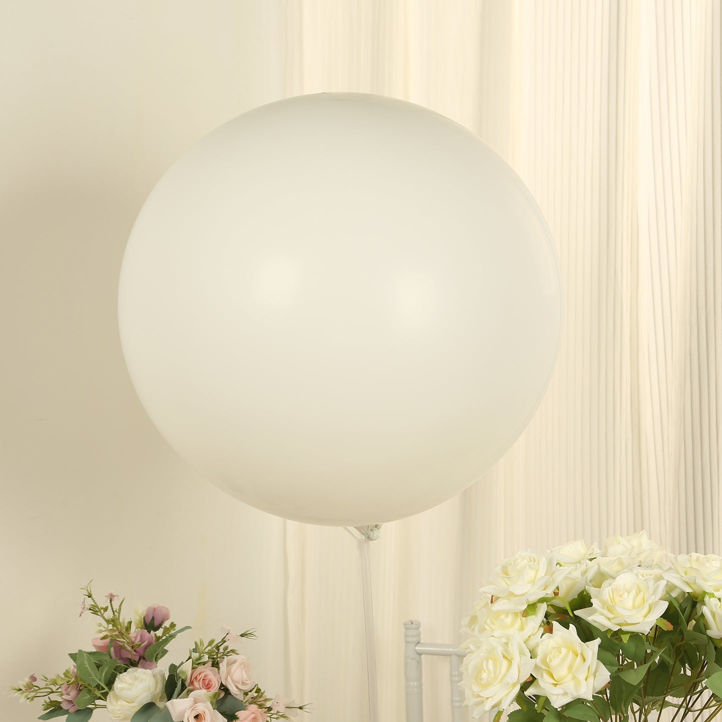 Large off white biodegradable balloon for eco-friendly parties.