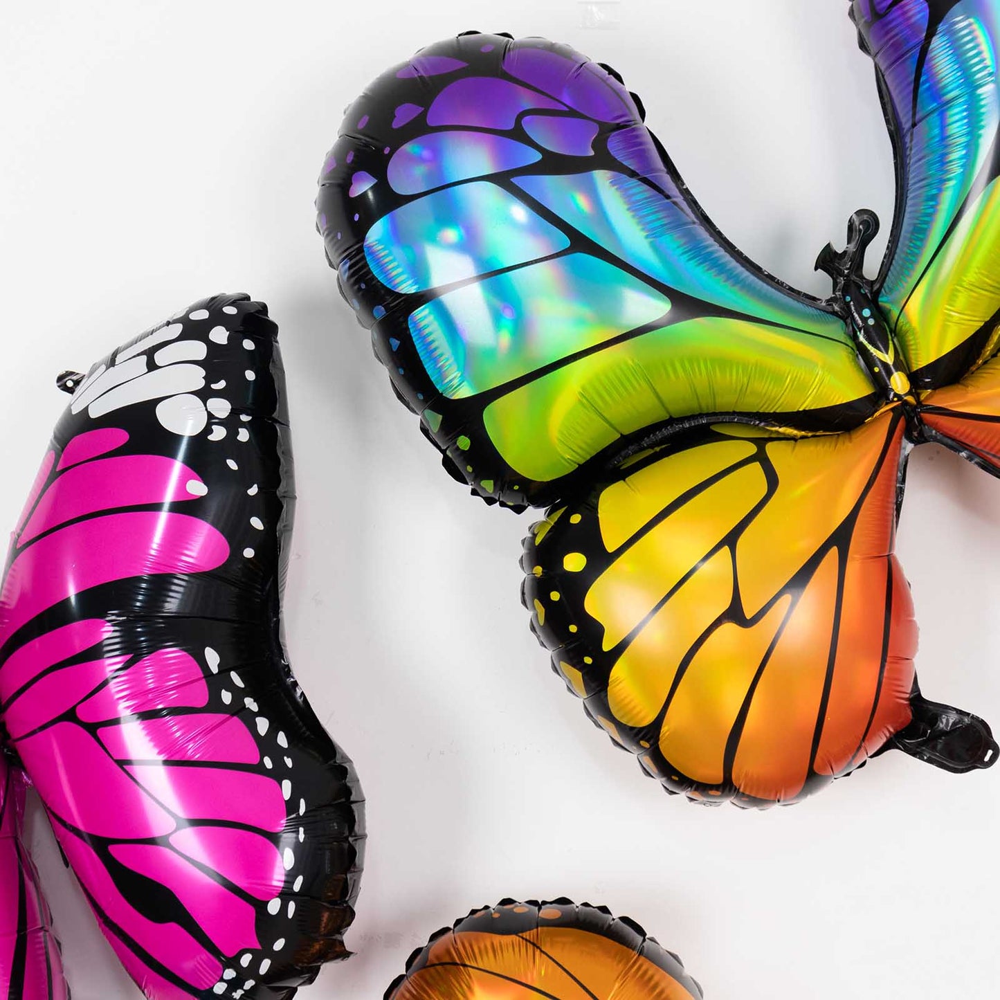 Colorful butterfly helium foil balloons for fairy tale theme party supplies.