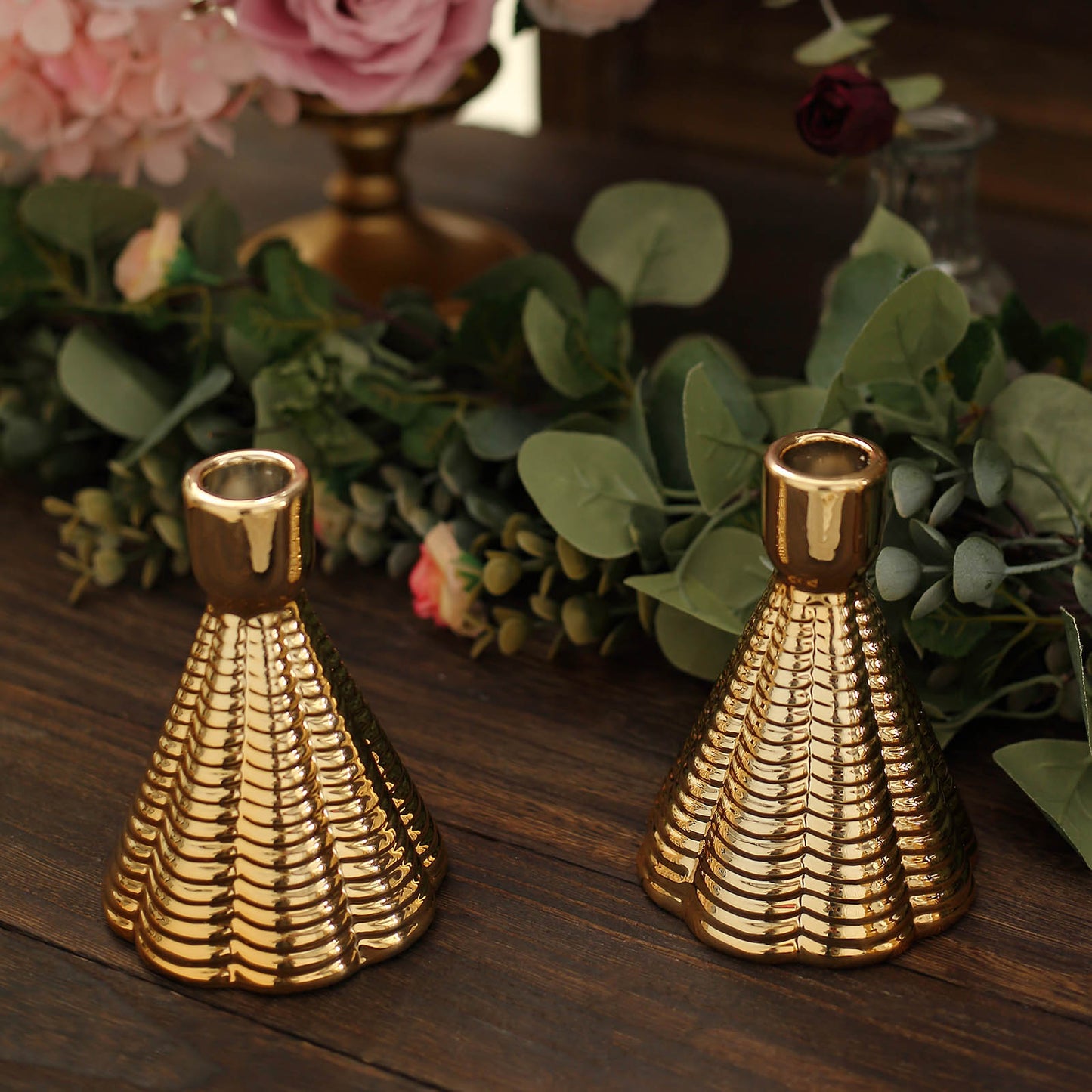 5" Metallic Gold Ribbed Ceramic Taper Candle Holders in a cone shape.
