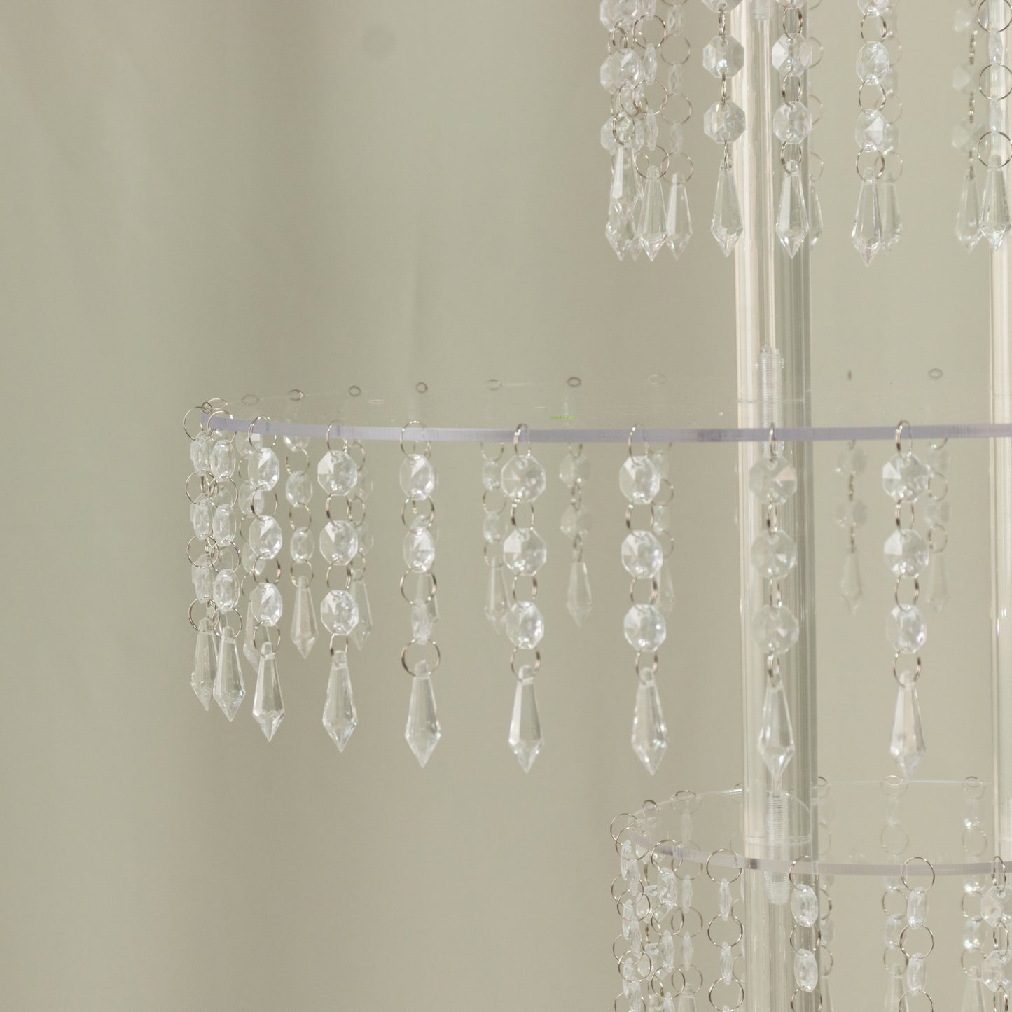 Clear acrylic chandelier flower stand with hanging crystals, 39" tall centerpiece.