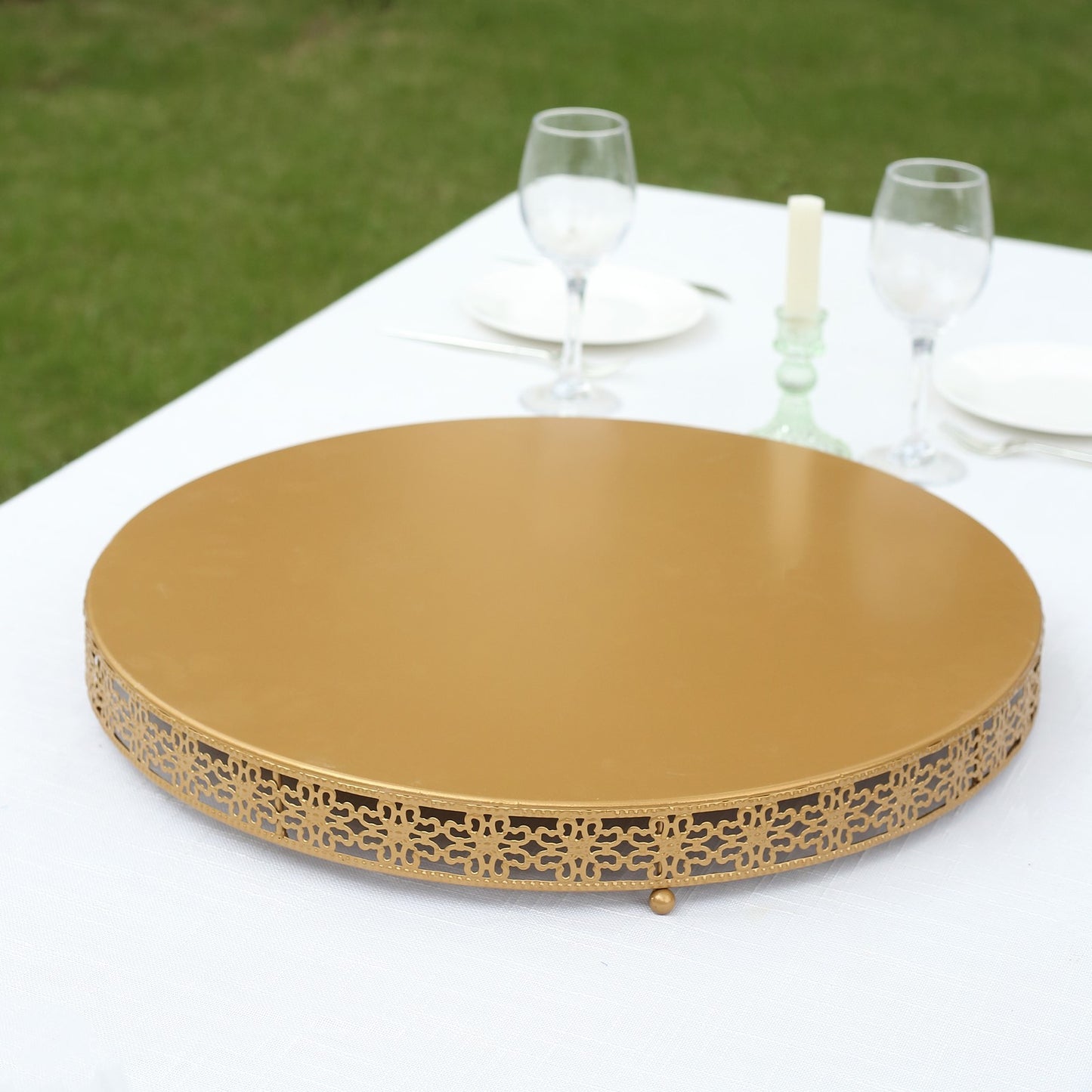 Gold metal round pedestal cake stand centerpiece for desserts.