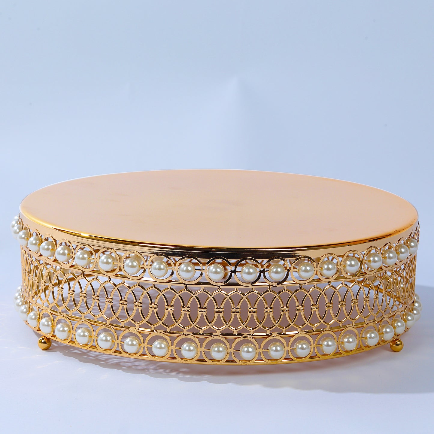 Gold pearl beaded cake stand with mirror top, stackable and round.