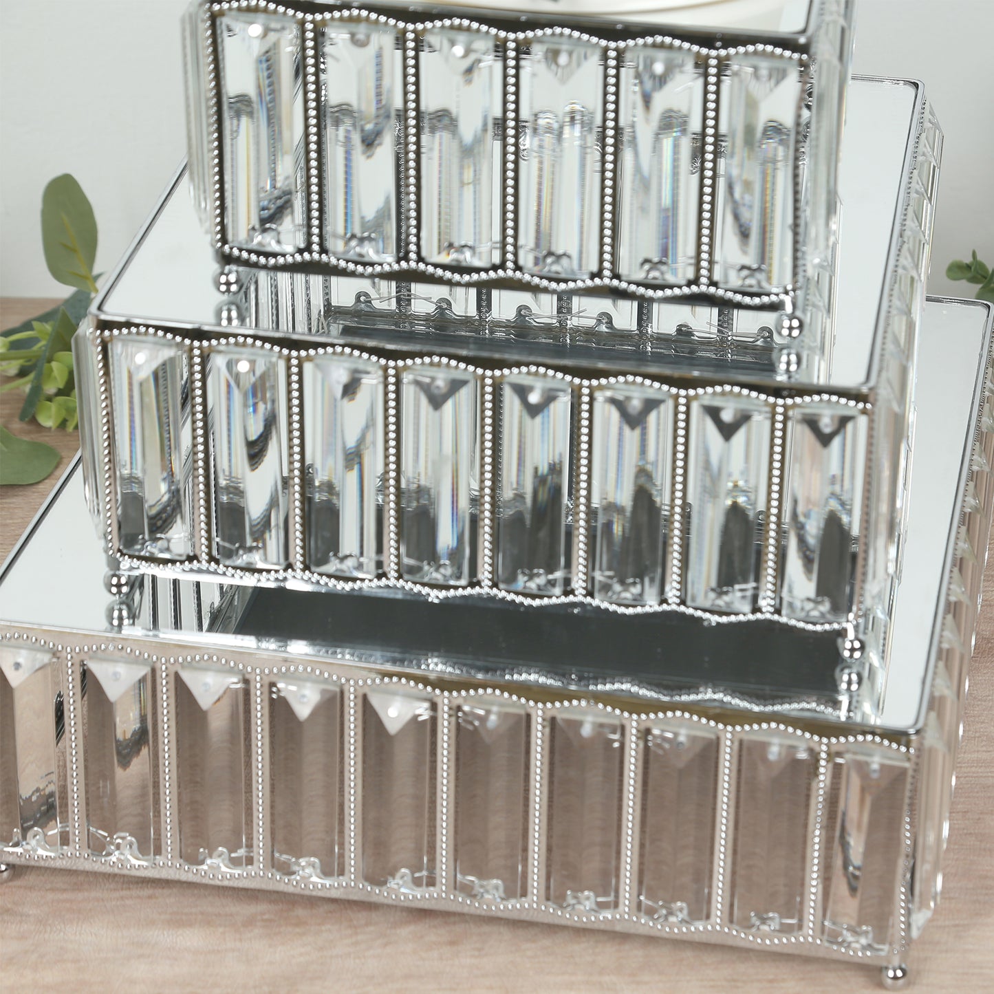 Set of 3 silver crystal pendant cake stands with mirror tops.