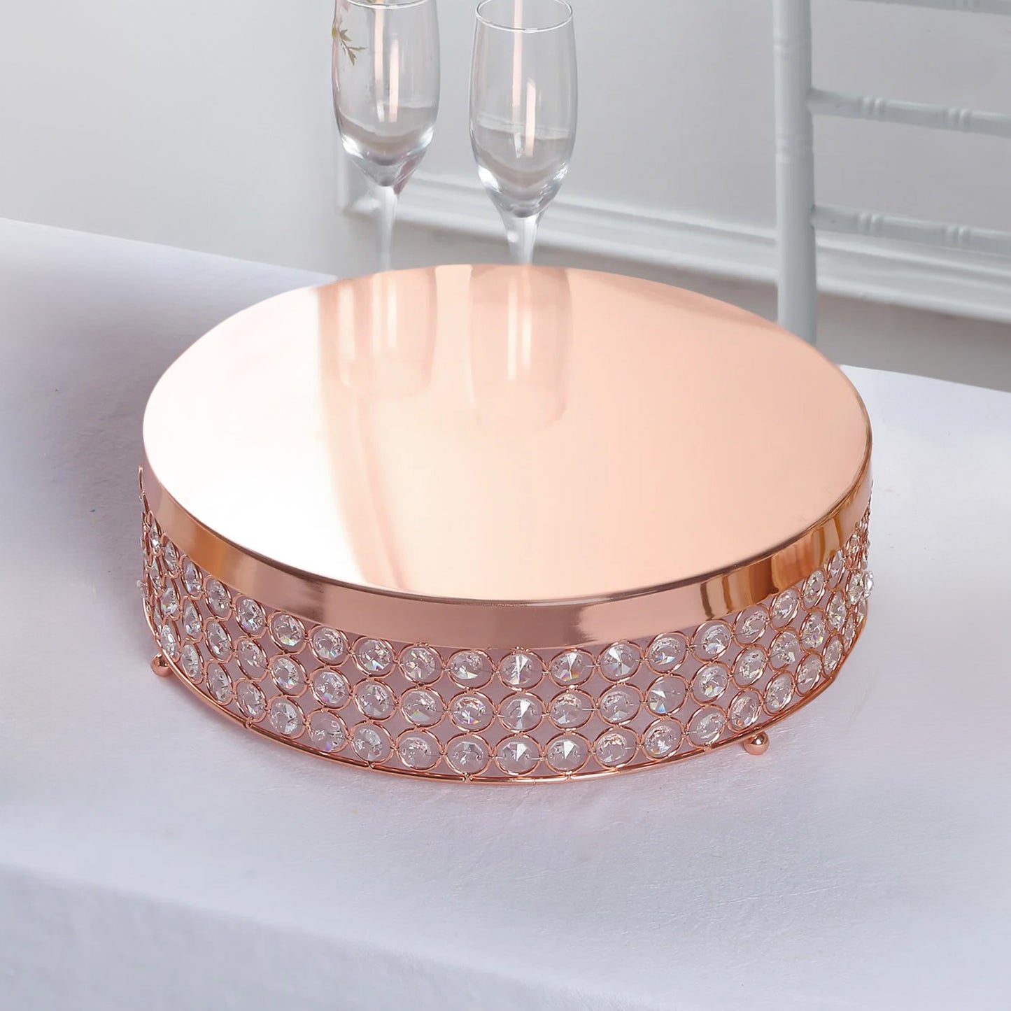 Rose gold crystal beaded cake stand pedestal for dessert display.