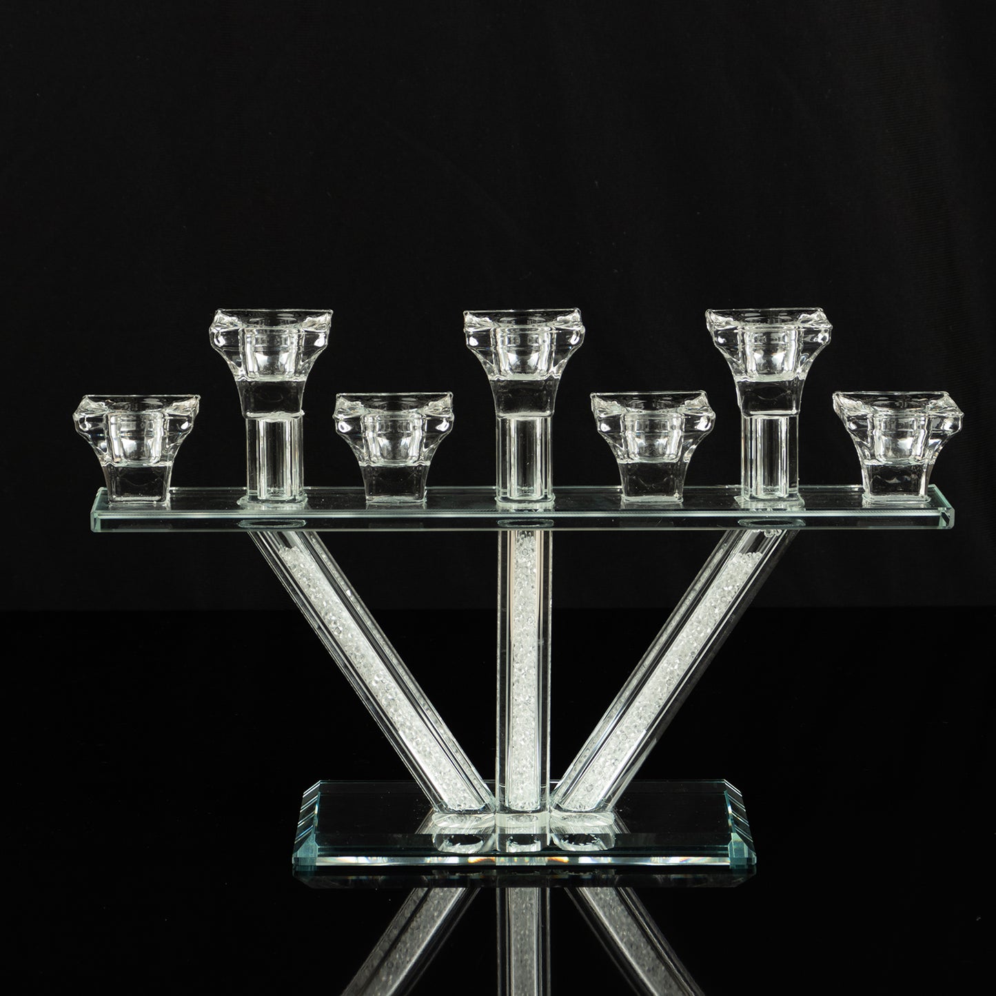 Clear crystal candelabra with 7 branches on a mirrored base.