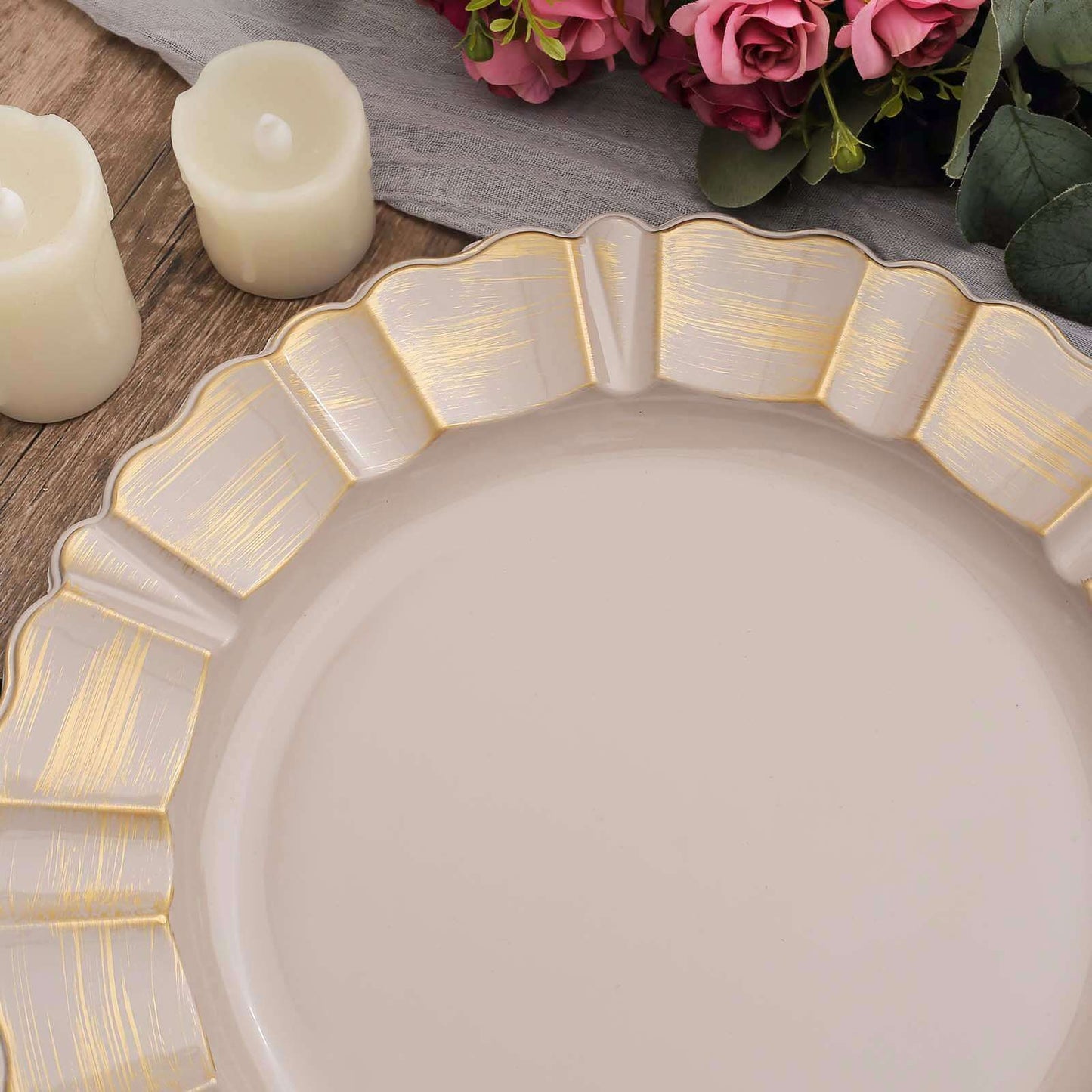Nude taupe acrylic charger plate with gold brushed scalloped rim.