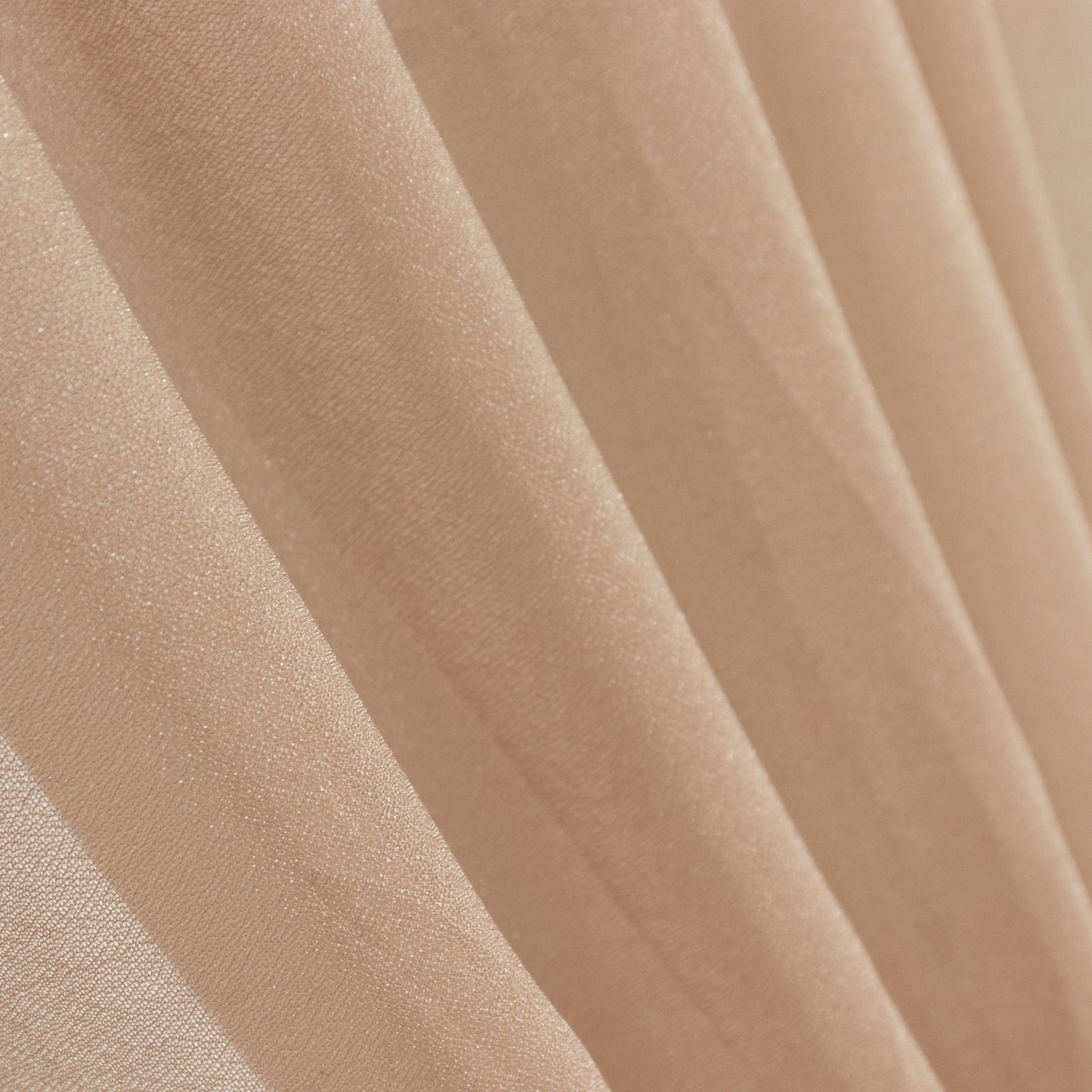 Taupe sheer backdrop drape with soft shimmer, ideal for wedding decor.