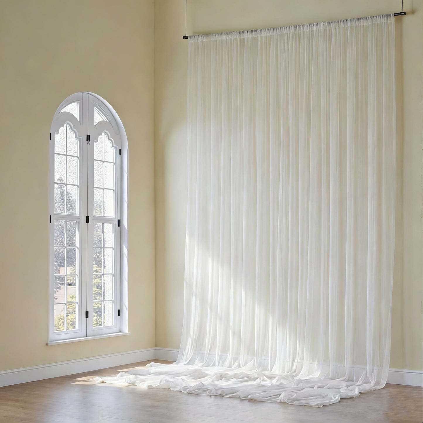 Ivory chiffon curtain panel, durable flame resistant backdrop, and ceiling drape.