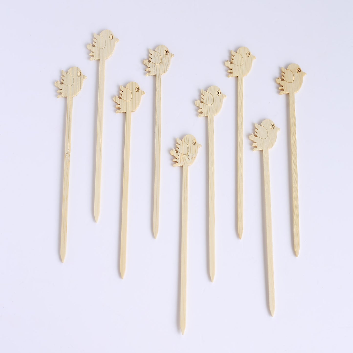 Natural bamboo bird skewers for eco-friendly parties, 5" long.