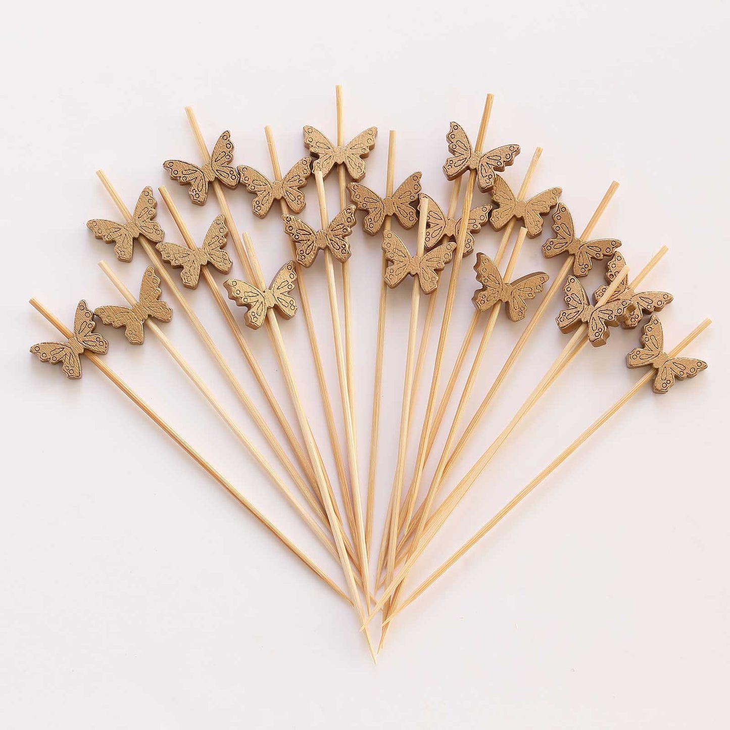 Natural bamboo butterfly cocktail sticks for eco-friendly parties.