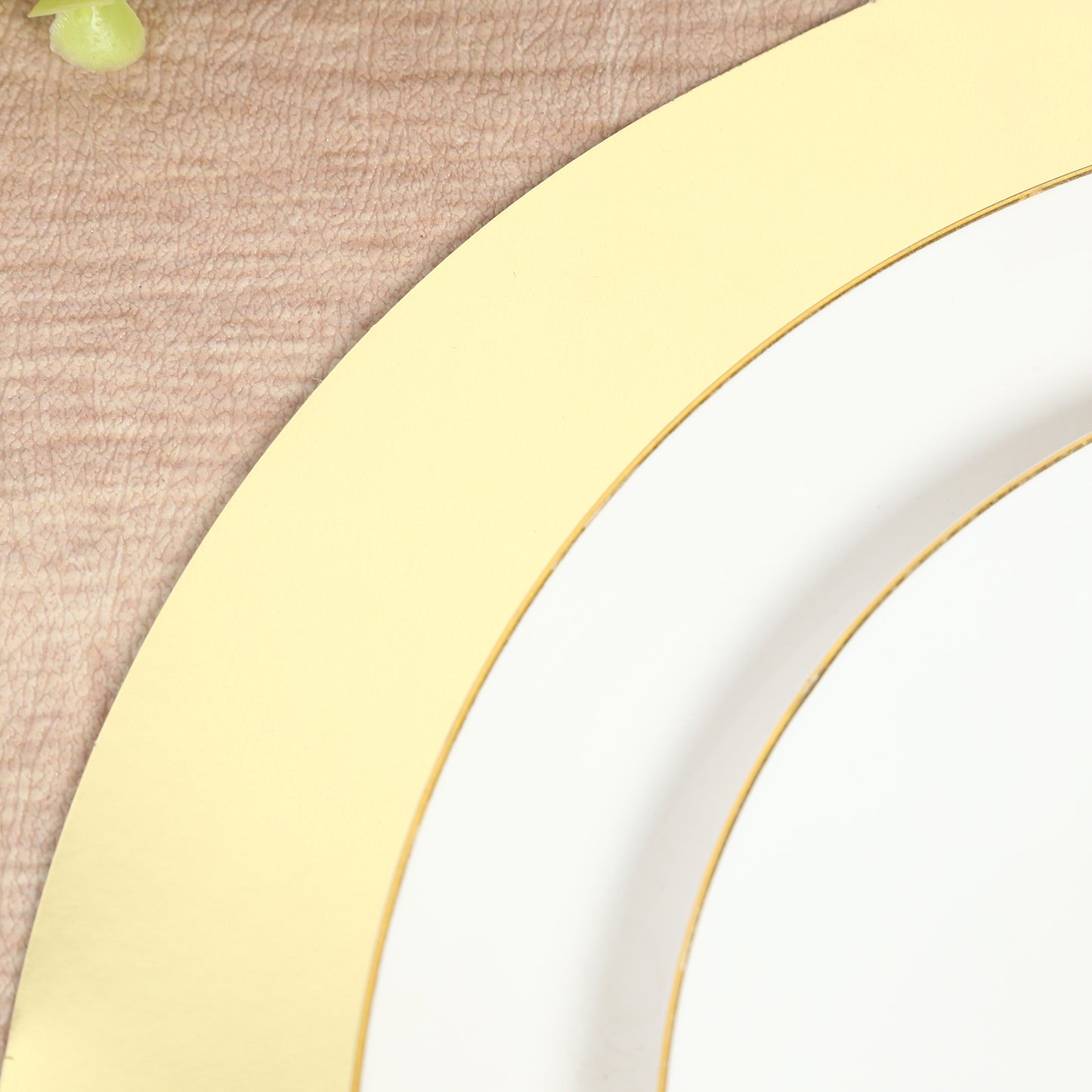 Gold round disposable table placemats for catering and special events.
