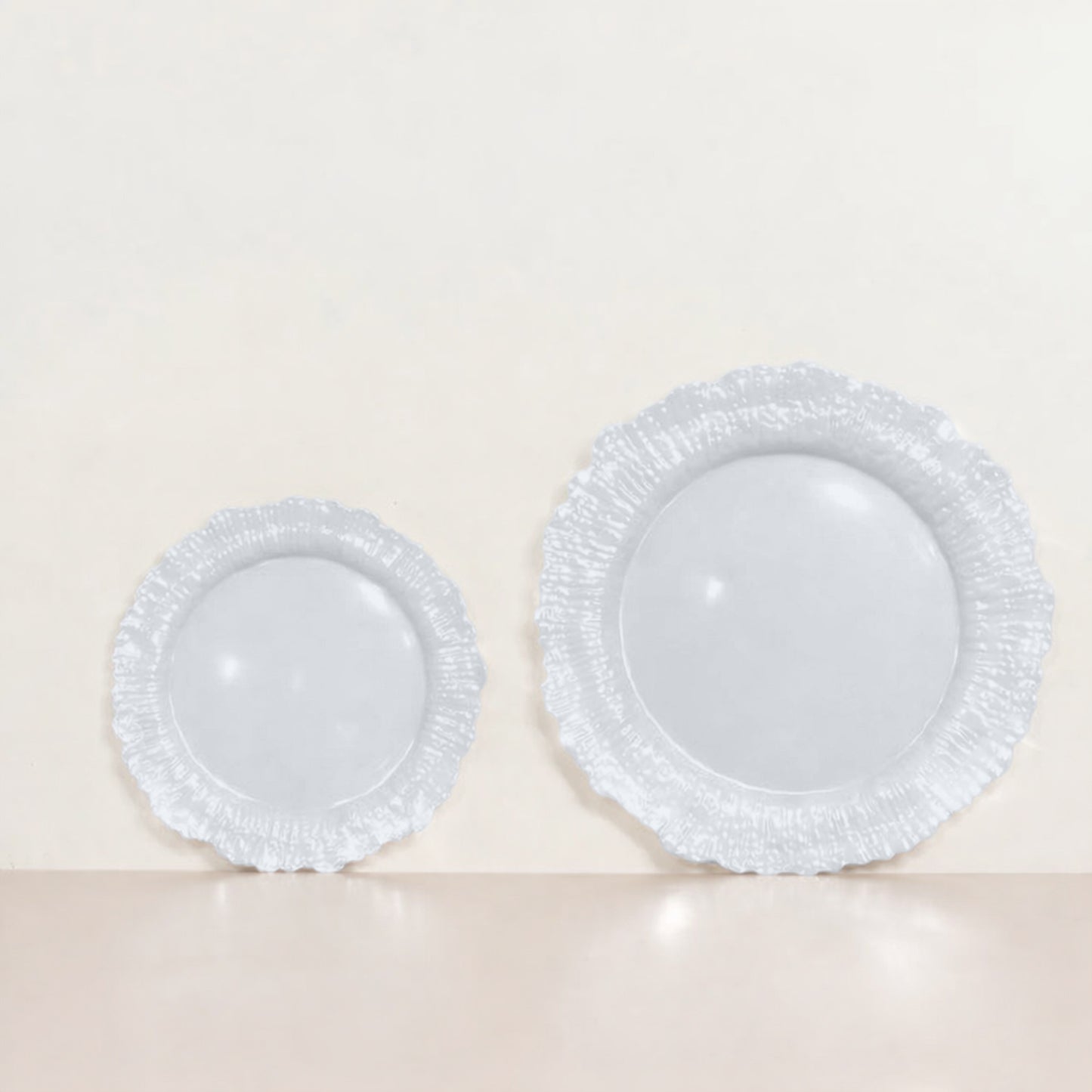 Pearl white dessert plates with a reef design, elegant disposable tableware.