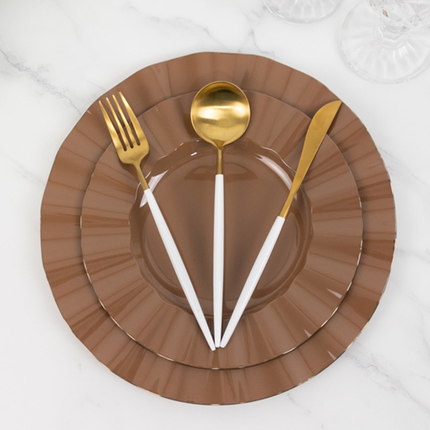 Coffee brown heavy duty disposable dinner plates with gold ruffled rim.