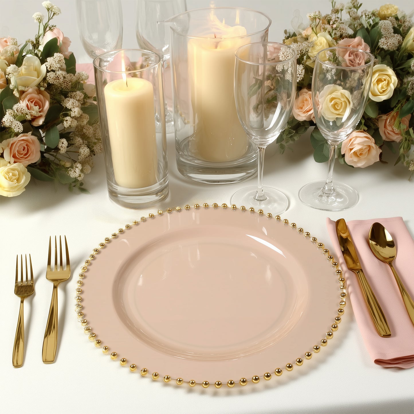Taupe round dinner plate with gold beaded rim on a festive table setting.
