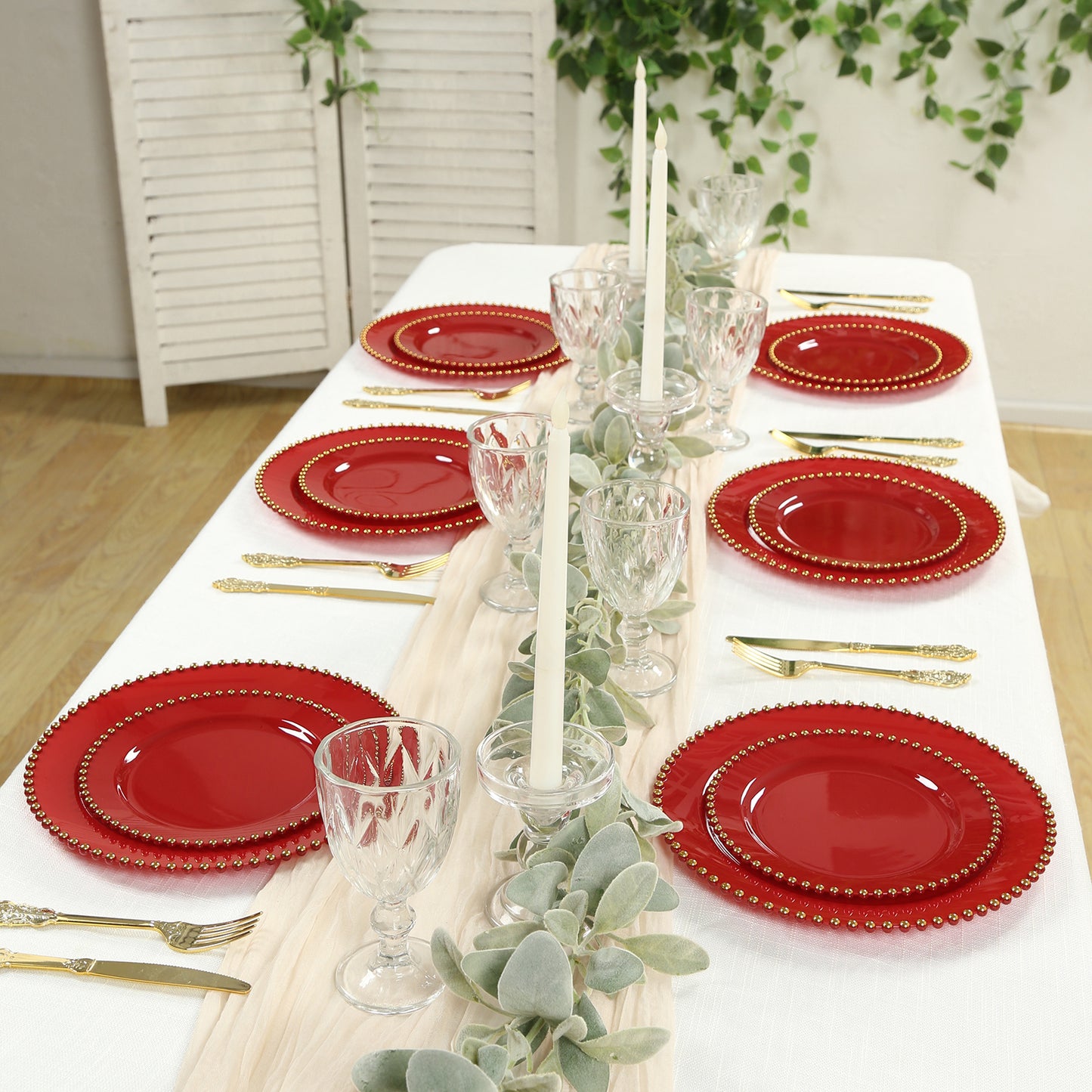 Red plastic dessert plates with gold beaded rim, perfect for parties and events.