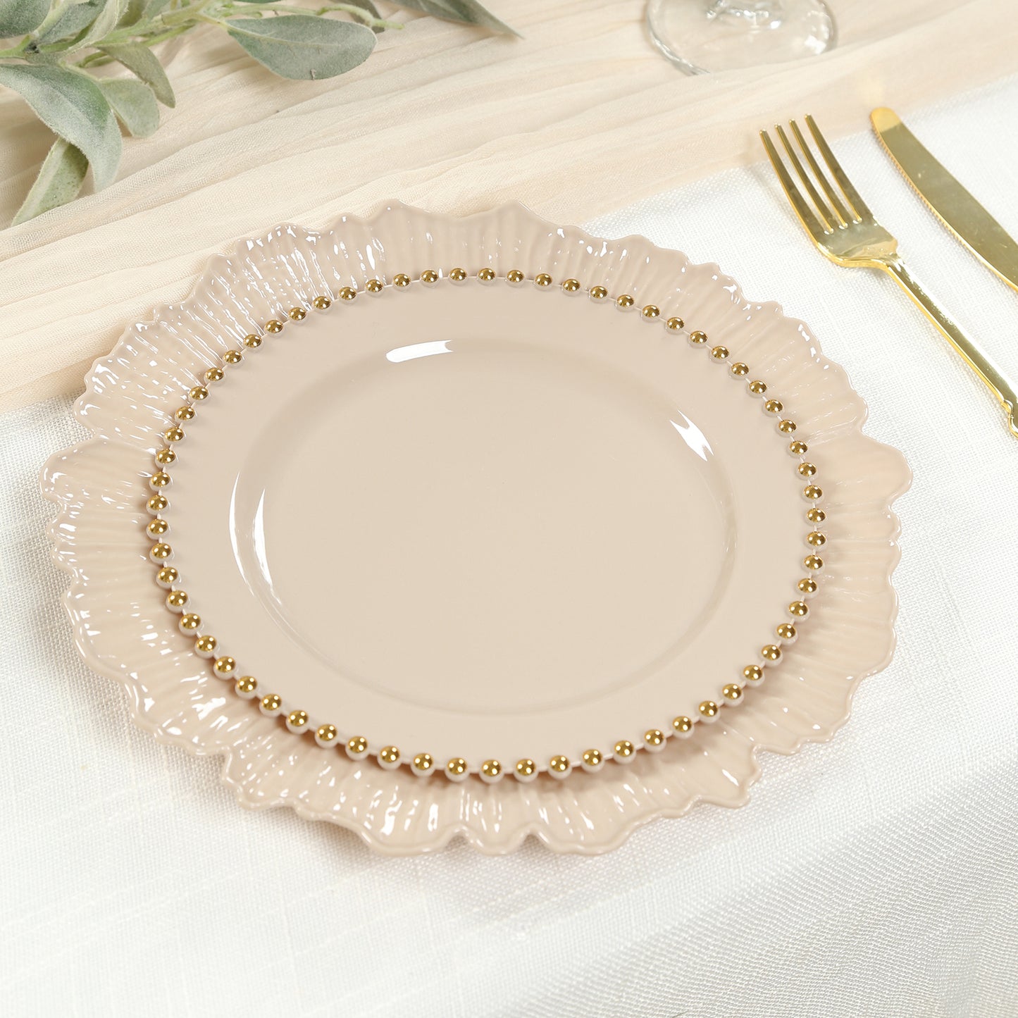 Taupe plastic dessert plate with gold beaded rim, 8" round, disposable.