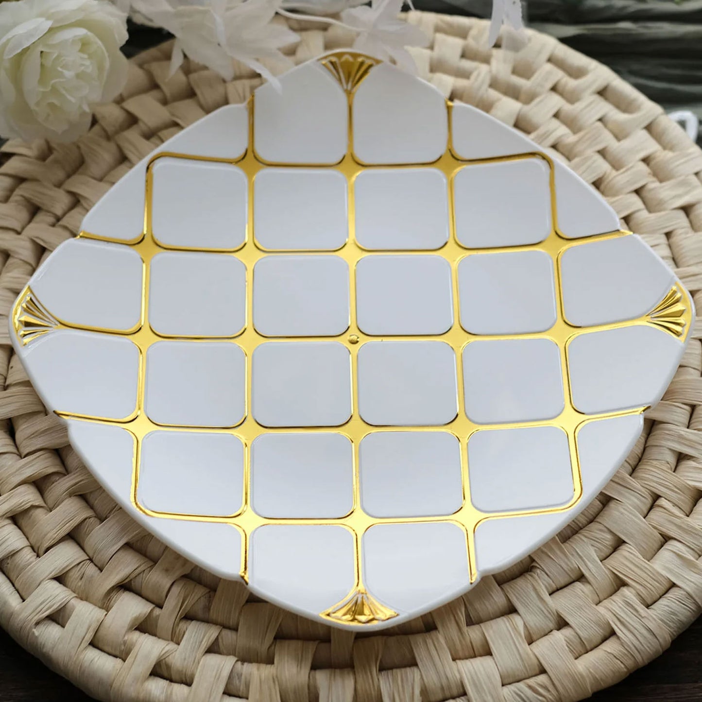 White and gold square geometric dinner plate, disposable, party use.