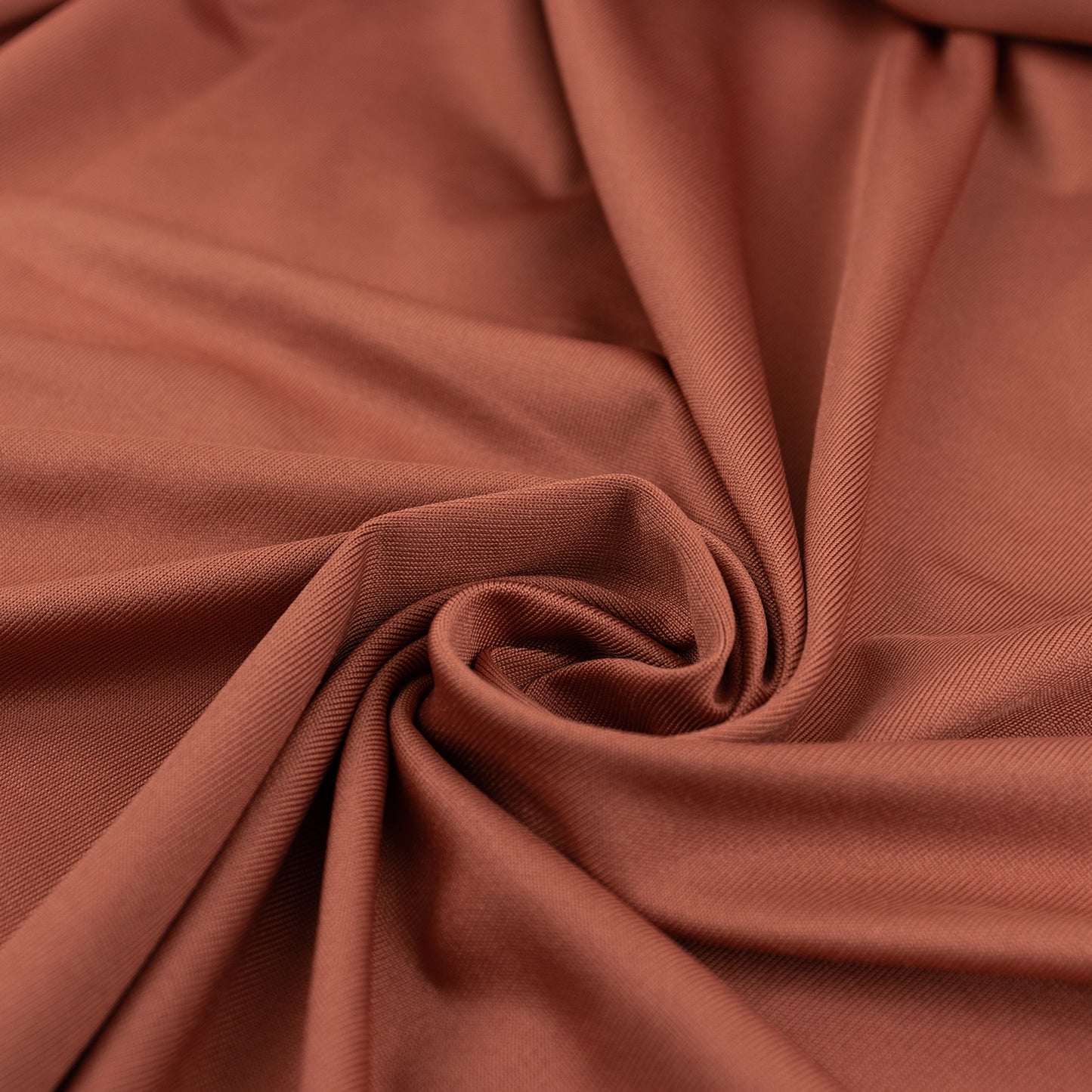 Terracotta spandex fabric roll, 60"x10 yards, perfect for DIY crafts.