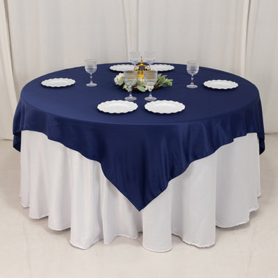 Sophisticated Charm with Navy Blue Lamour Satin Table Overlay Sophisticated Charm with Navy Blue Lamour Satin Table Overlay