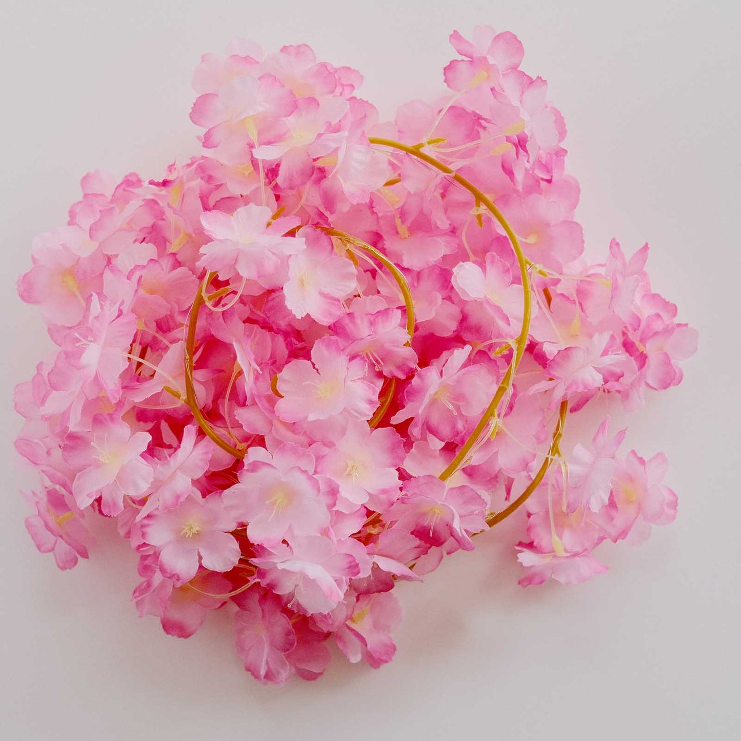 Pink cherry blossom fairy string lights for party décor.