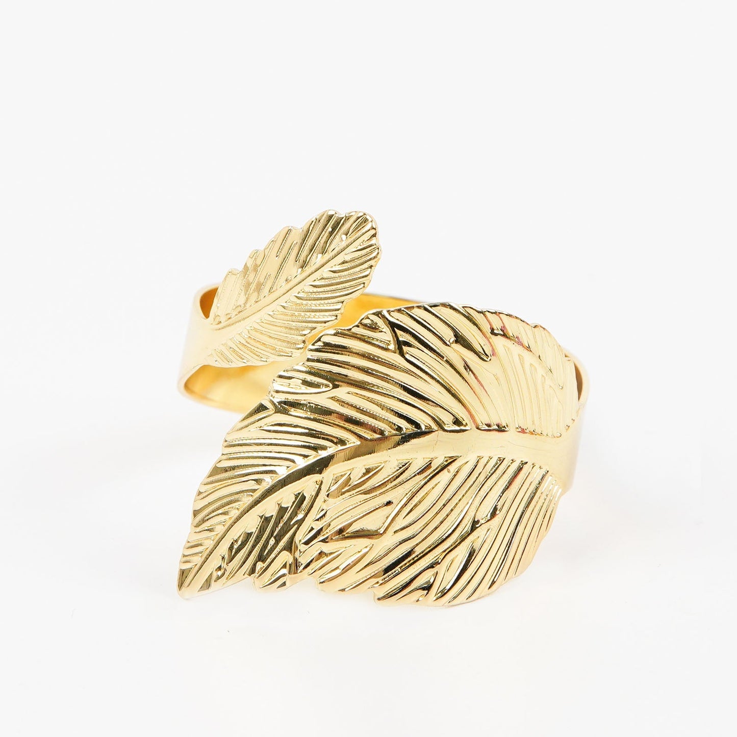 Metallic gold ornate leaf napkin ring holder.