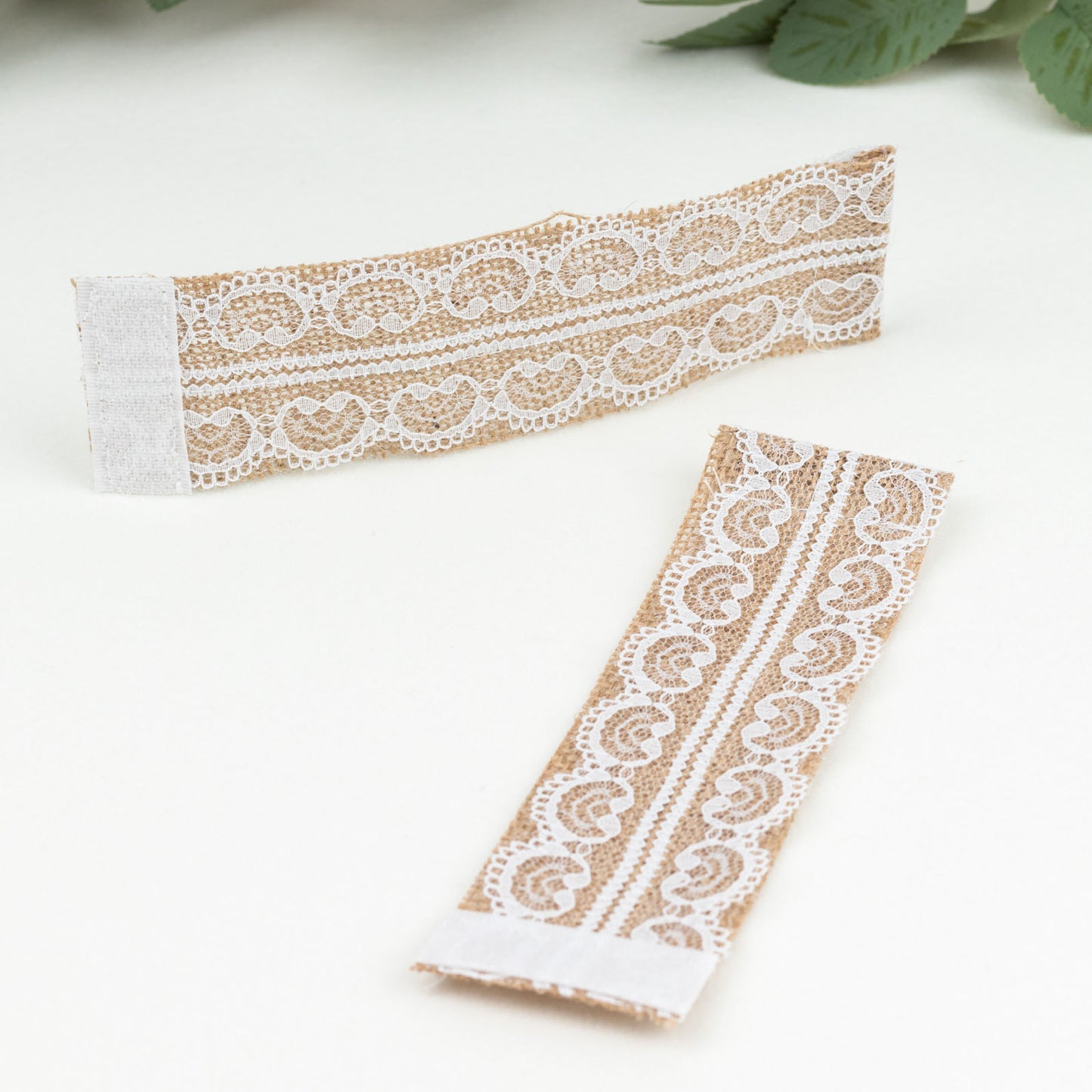 Rustic burlap and lace napkin rings for farmhouse decor.