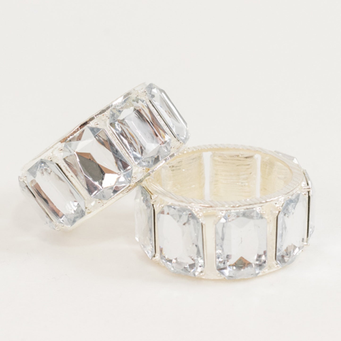 Crystal diamond gem napkin rings for elegant table decor.