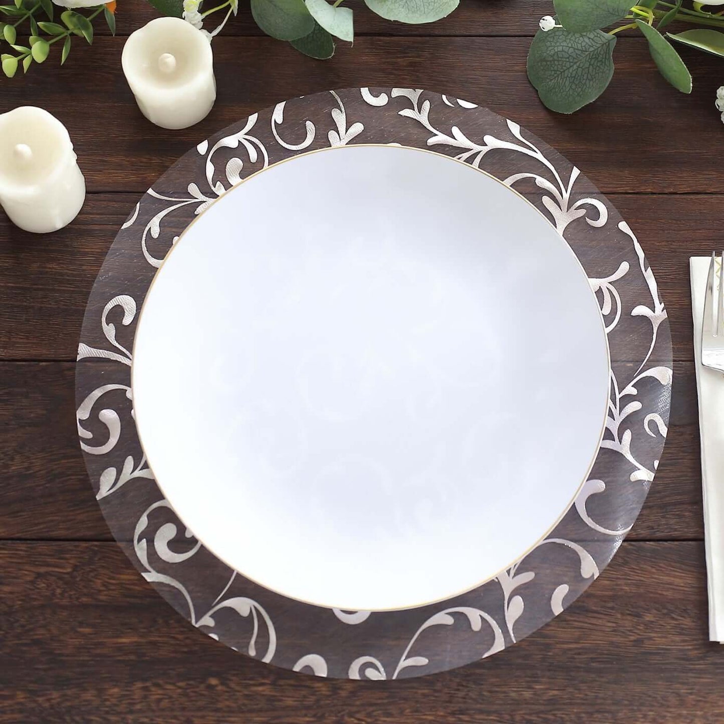 Metallic silver sheer organza placemat with embossed floral design.