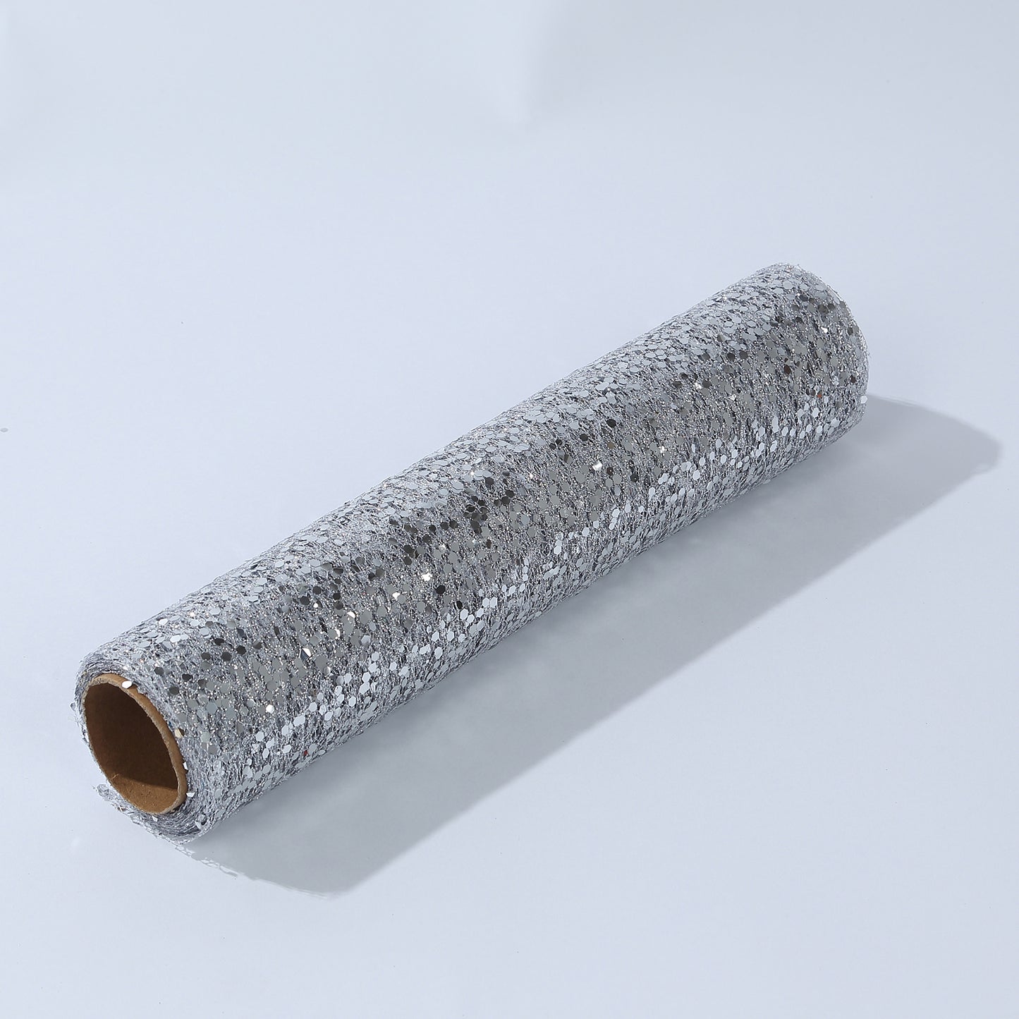 Metallic silver glitter table runner for event decoration.