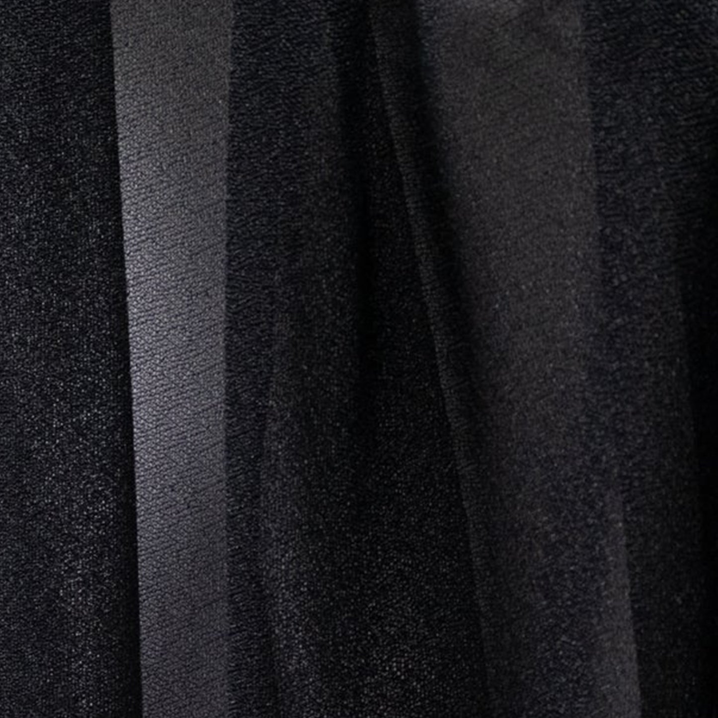 Black sheer chair drape decor with a shimmer finish. #whtbkgd