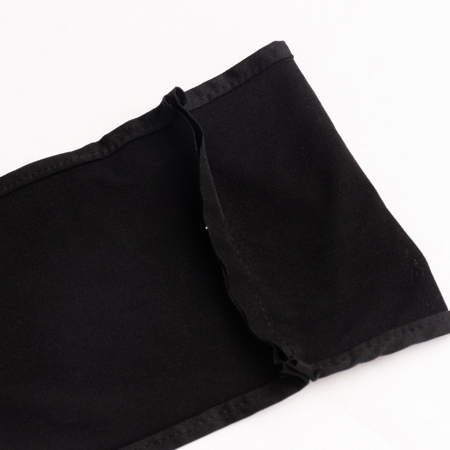 Black spandex chair sash with gold diamond buckle detail.
