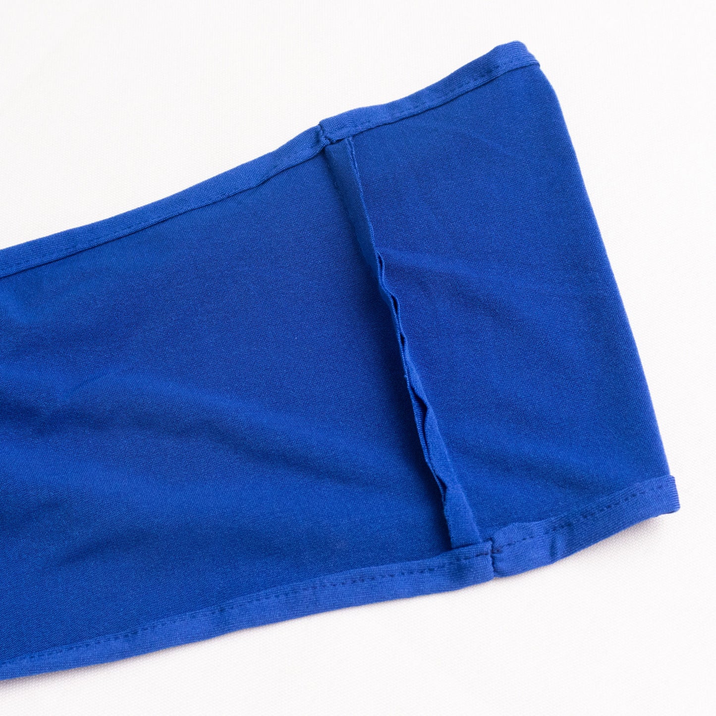 Royal blue spandex chair sash with gold diamond buckle.