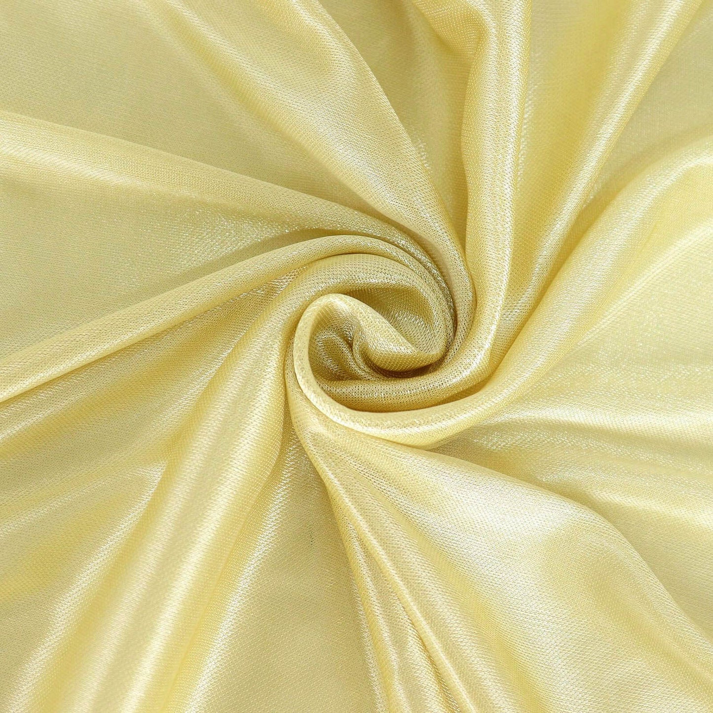 Champagne pleated satin table skirt fabric in a swirl pattern.