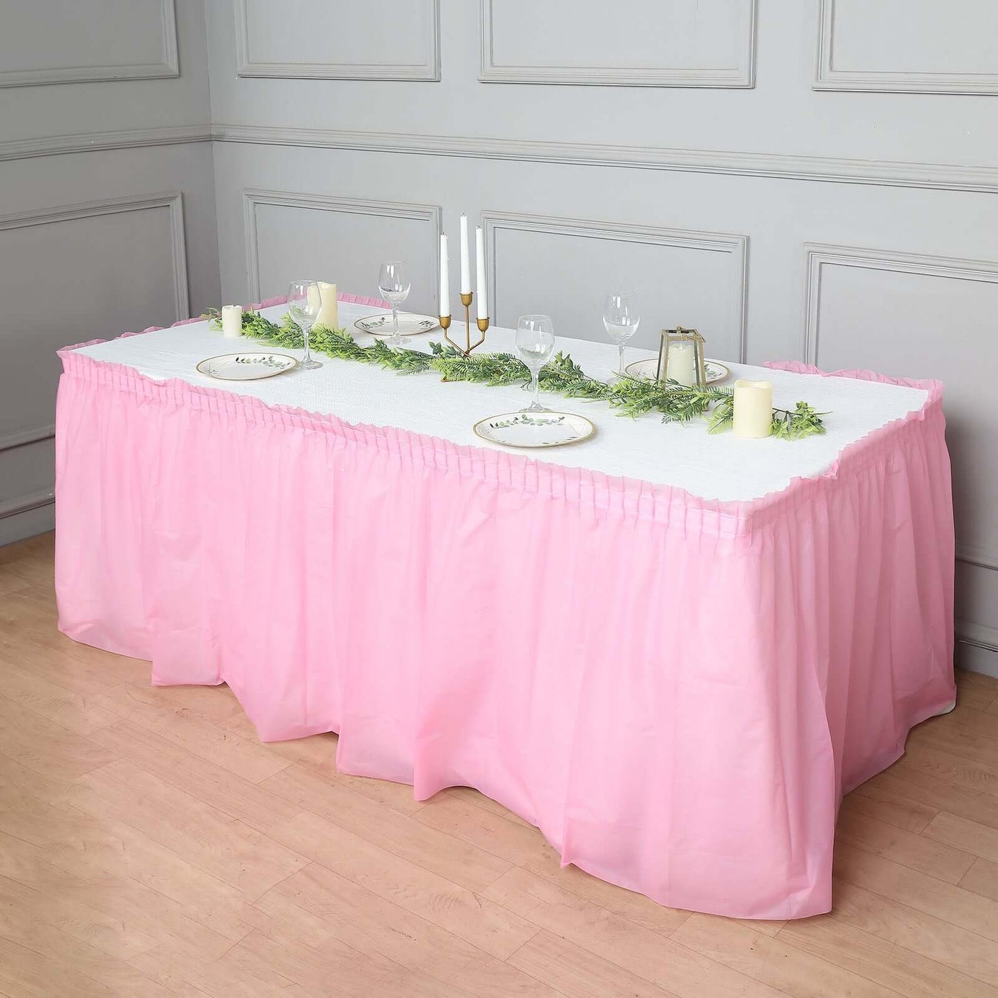 Pink ruffled disposable table skirts for events, 14ft long, pack of 5.
