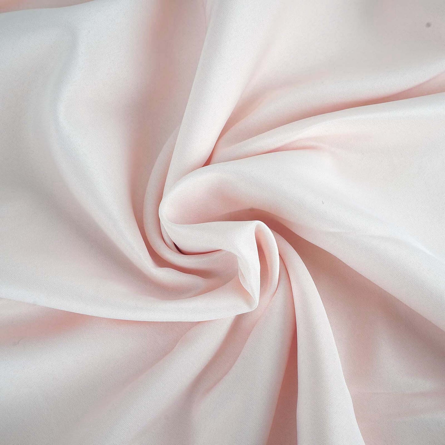 Blush seamless polyester round tablecloth fabric.