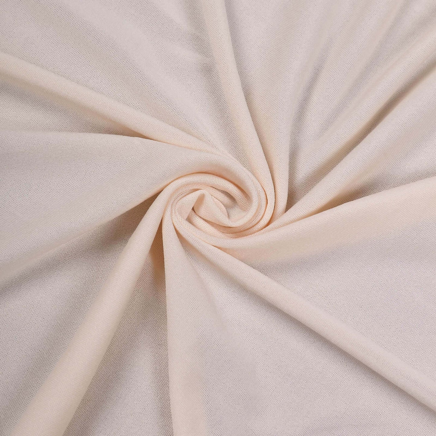 Blush spandex round cocktail table cover with natural wavy drapes.