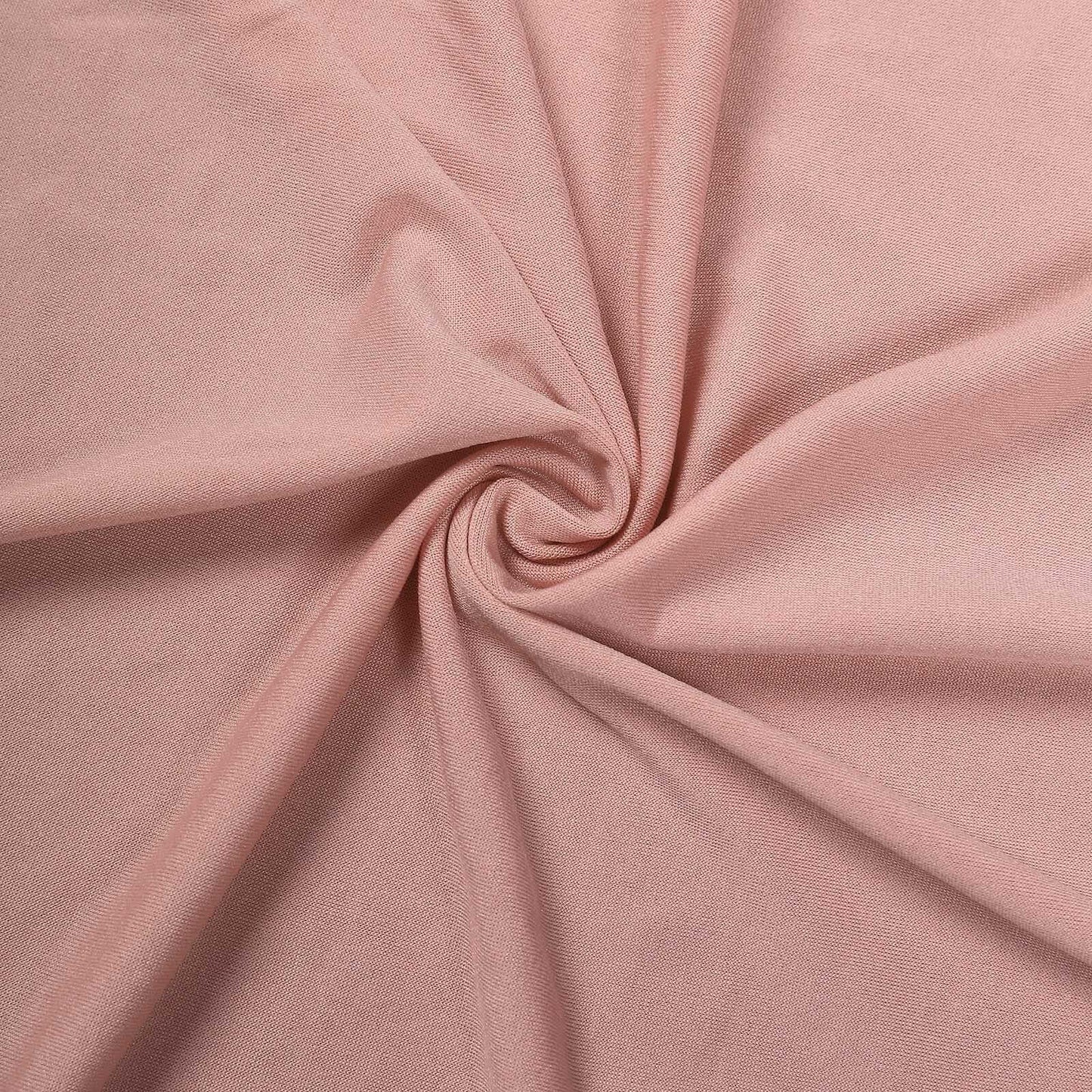 Dusty rose spandex cocktail table cover with natural wavy drapes.