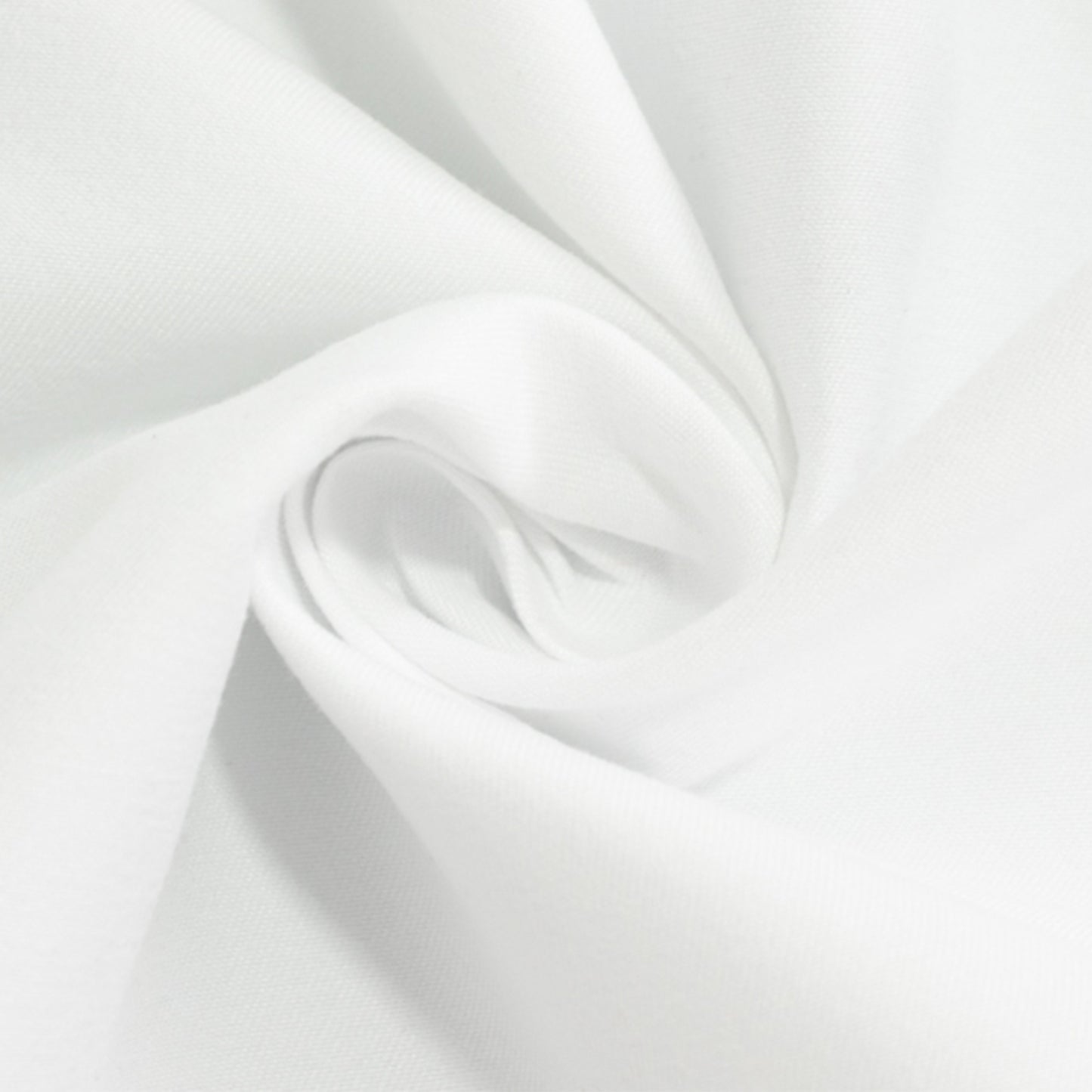 White cotton blend tablecloth fabric close-up.
