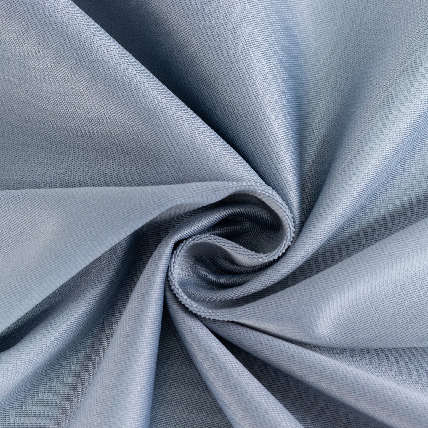 70" Dusty Blue Scuba Wrinkle Free Round Tablecloth in soft dusty blue color.
