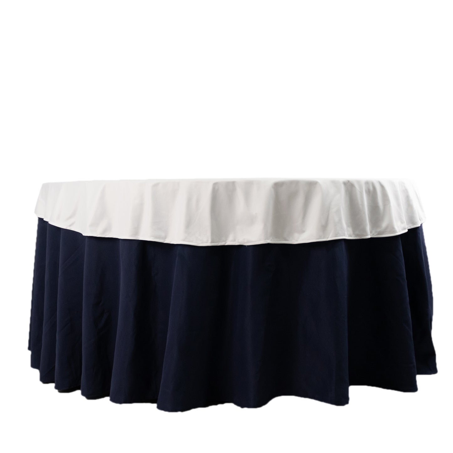 70" White Scuba Round Tablecloth on a navy blue table.