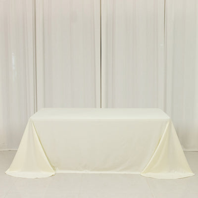 Ivory Scuba Rounded Corner Rectangular Tablecloth 90"x132" Ivory Scuba Rounded Corner Rectangular Tablecloth 90"x132"