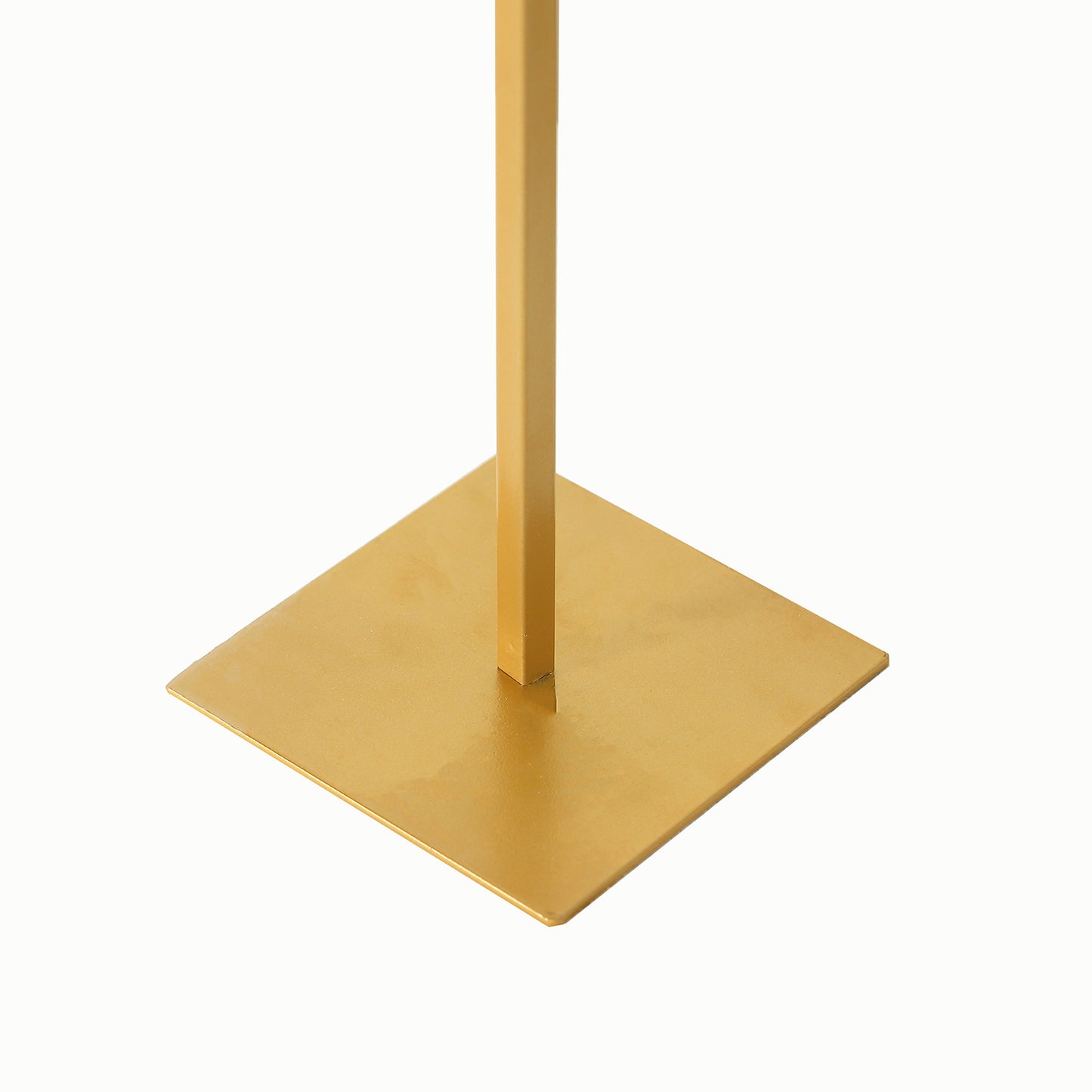Gold metal wedding cake display stand with rounded top and detachable base.