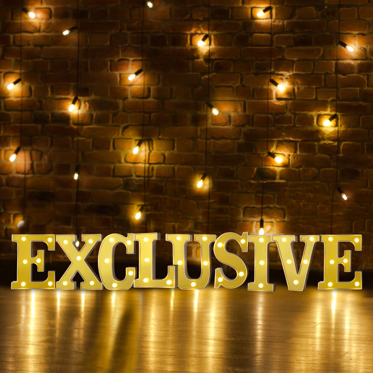 Gold 3D marquee letter "E" with warm white LED lights.
